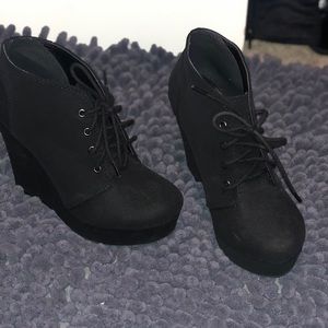 Black wedge booties
